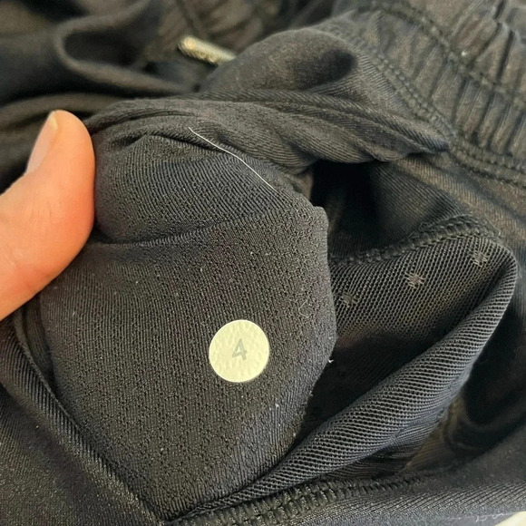 Lululemon black joggers with drawstring elastic waist band, and hemline. Size 4 - Picture 7 of 13